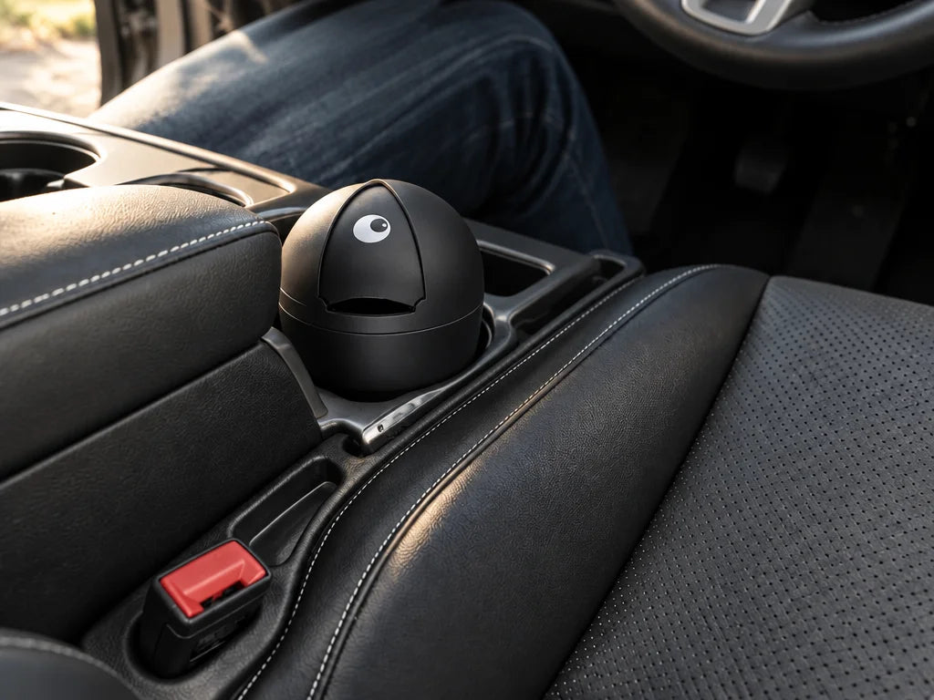 Show a close detail of this exact covered car trash can sitting in a suitable vehicle holder, with r