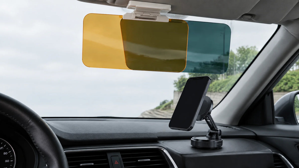 A photograph of an ordinary unbranded car cockpit with the exact three-panel HD anti-glare visor acc