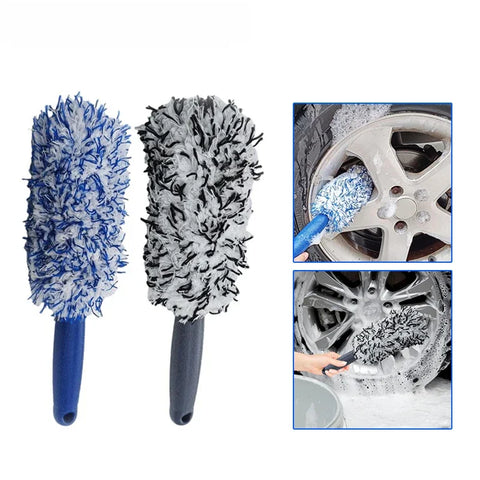 Cleaning a vehicle wheel with a detailing brush