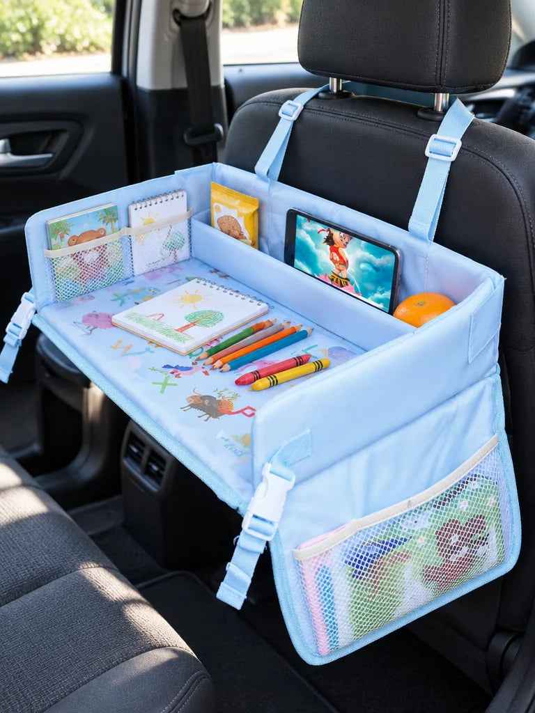 Show this exact foldable kids car travel tray attached to the back seat of a real vehicle, holding d