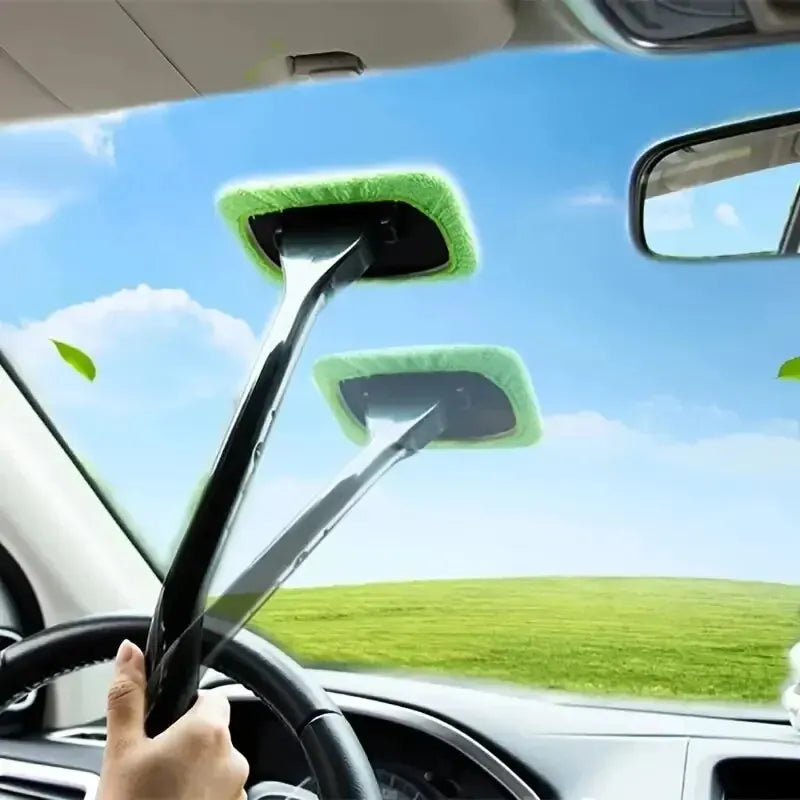 Windshield cleaning tool with angled head