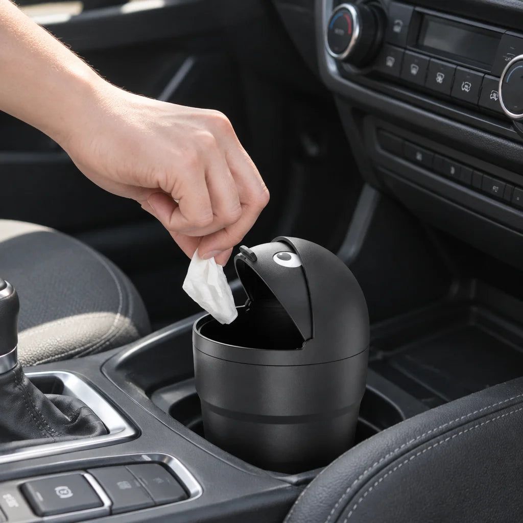 Show this exact compact car trash can being used inside a real vehicle for small everyday waste, wit