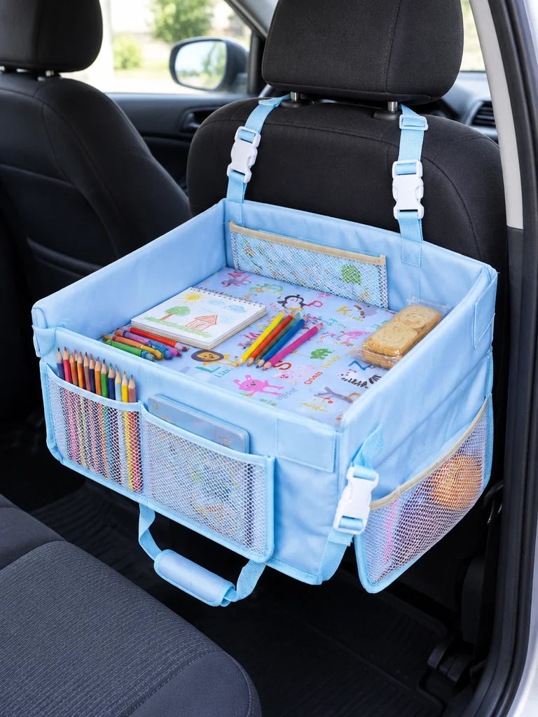 Show this exact foldable kids car travel tray attached to a real back seat with drawing materials an