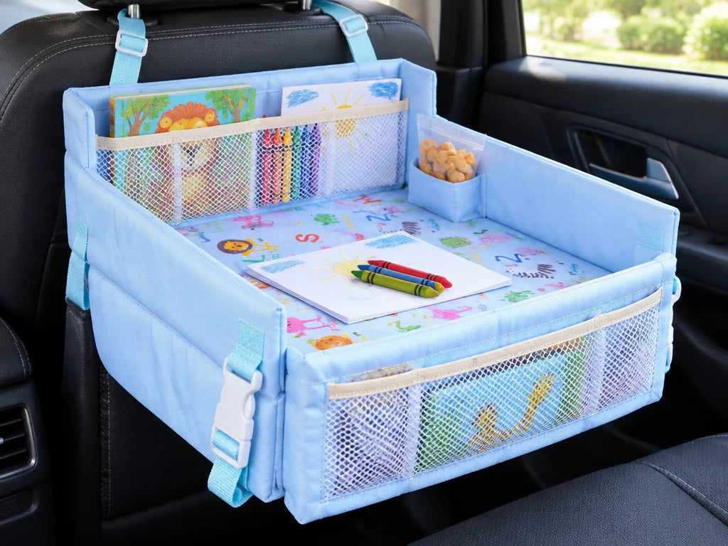 Show a close detail of this exact travel tray’s foldable surface, storage, and rear-seat straps. Pre